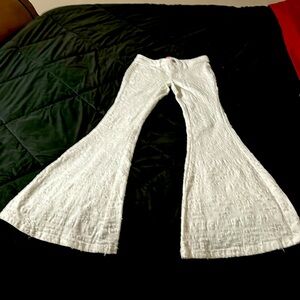 White bellbottoms women’s pants Dolls Kill